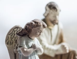 angel and man ceramic figurine thumbnail
