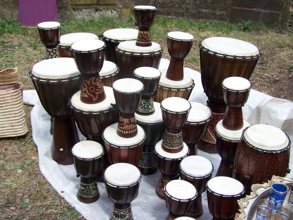brown wooden conga and bong drums lot preview