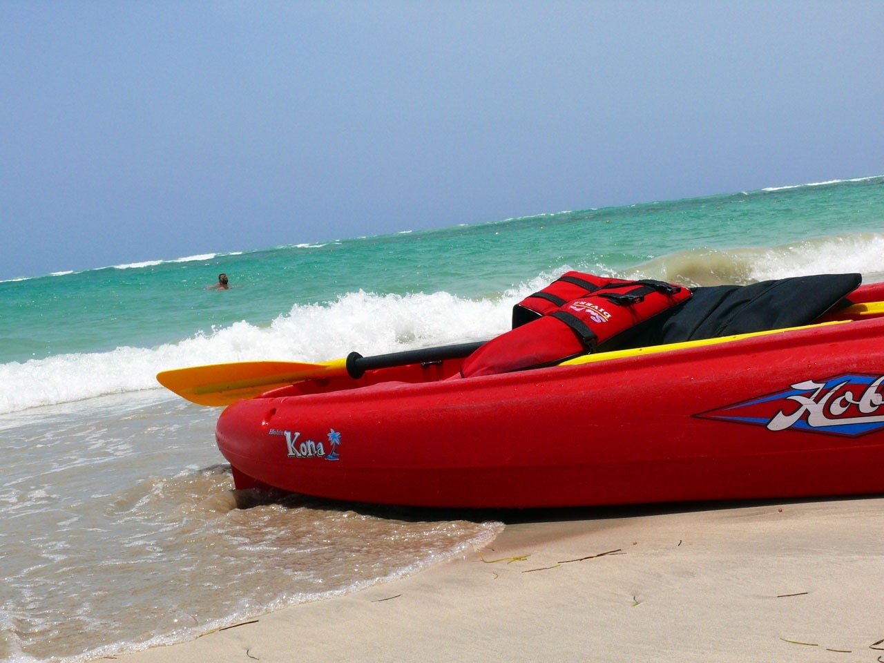 red and yellow inflatable boat