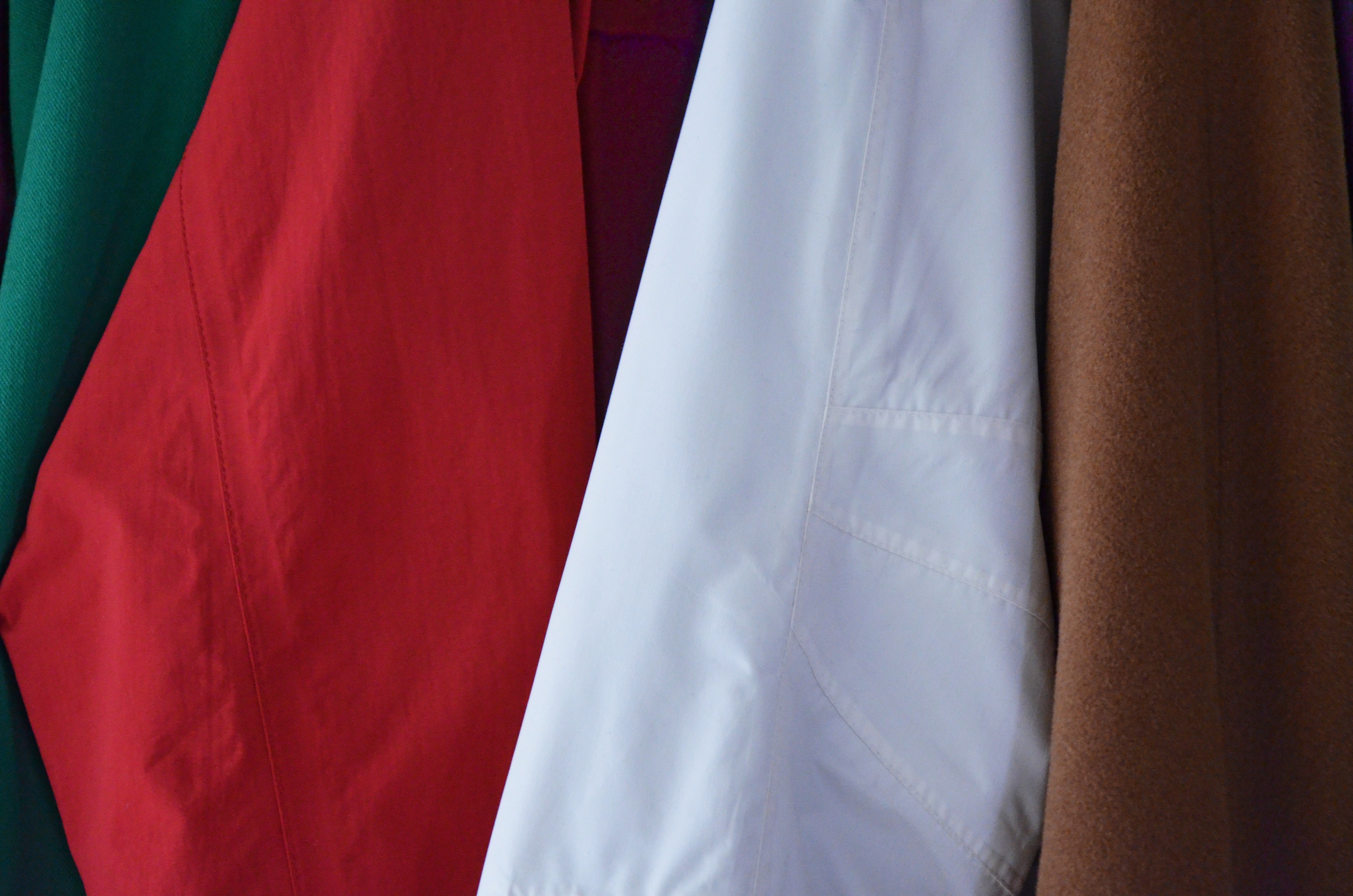 green, red, white and brown textiles