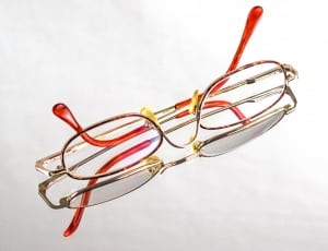 red and gold frame eyeglasses thumbnail