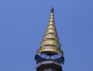 beige cone shaped tower top thumbnail