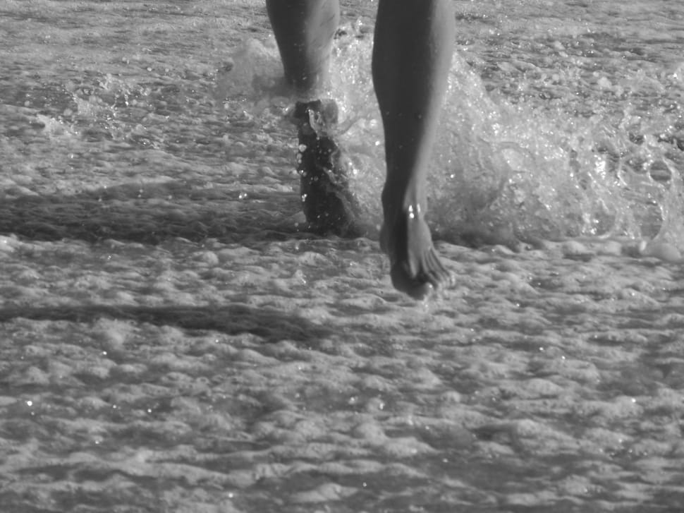 greyscale photo of person on water\ preview