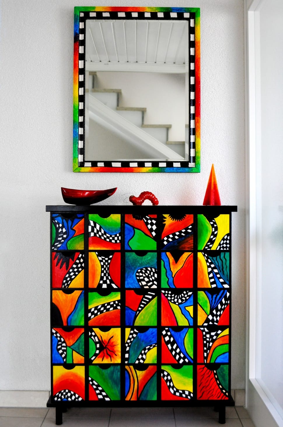 red yellow blue and green print wall decor preview