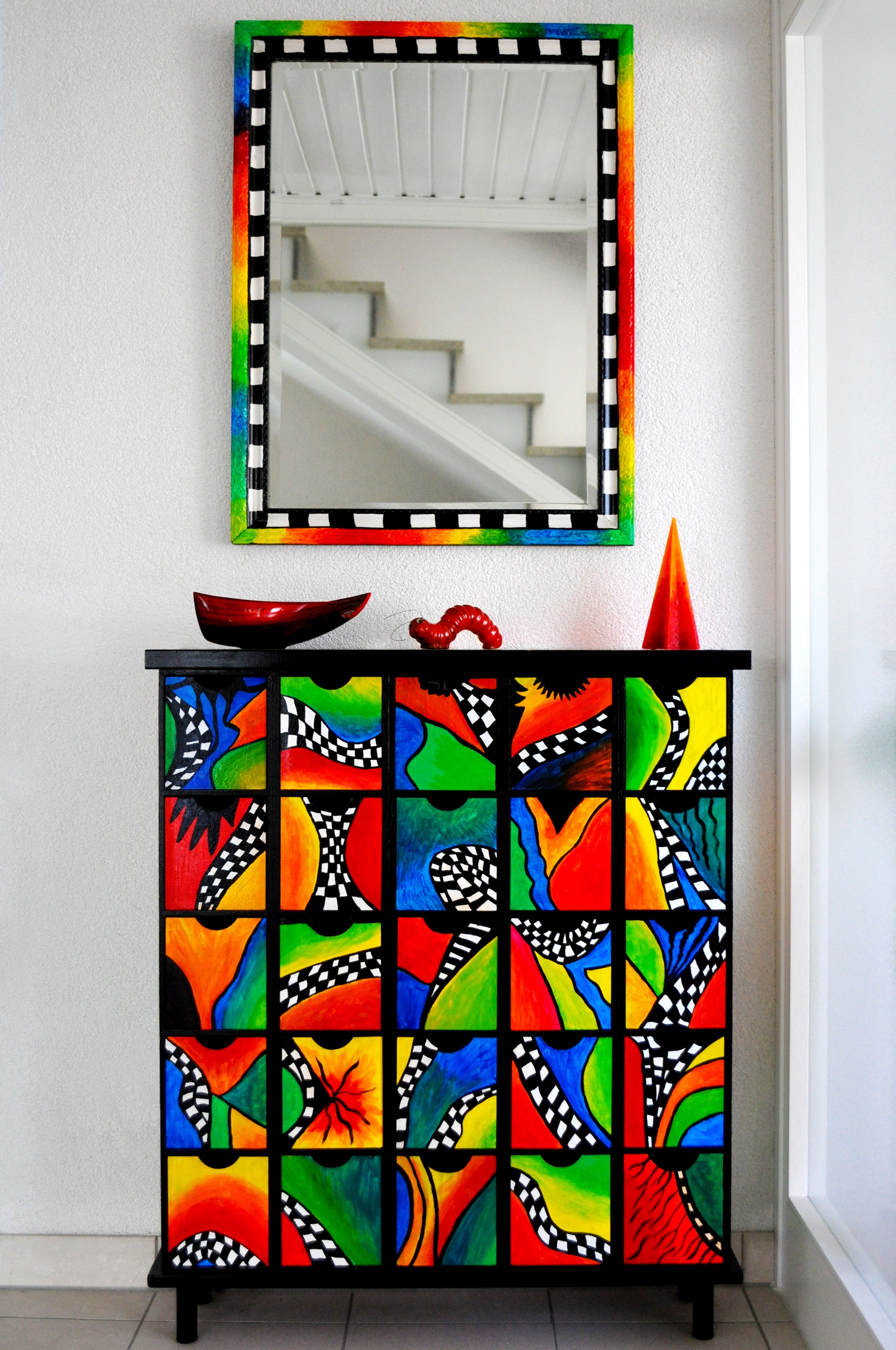 red yellow blue and green print wall decor