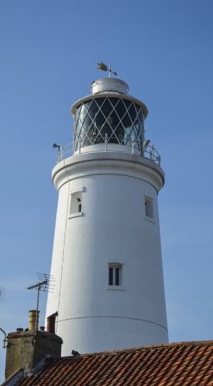 white painted lighthouse thumbnail
