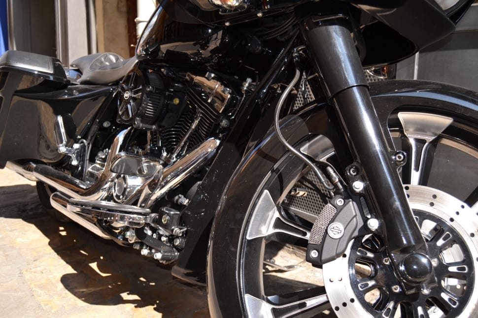 black and silver touring motorcycle preview