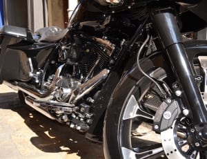 black and silver touring motorcycle thumbnail