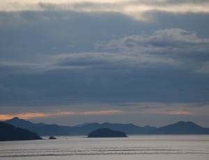 silhouette photo of an island thumbnail