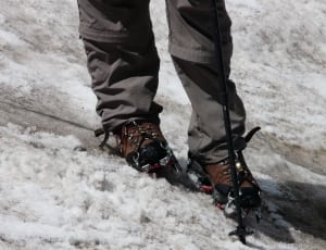 pair of brown and black snow boots thumbnail