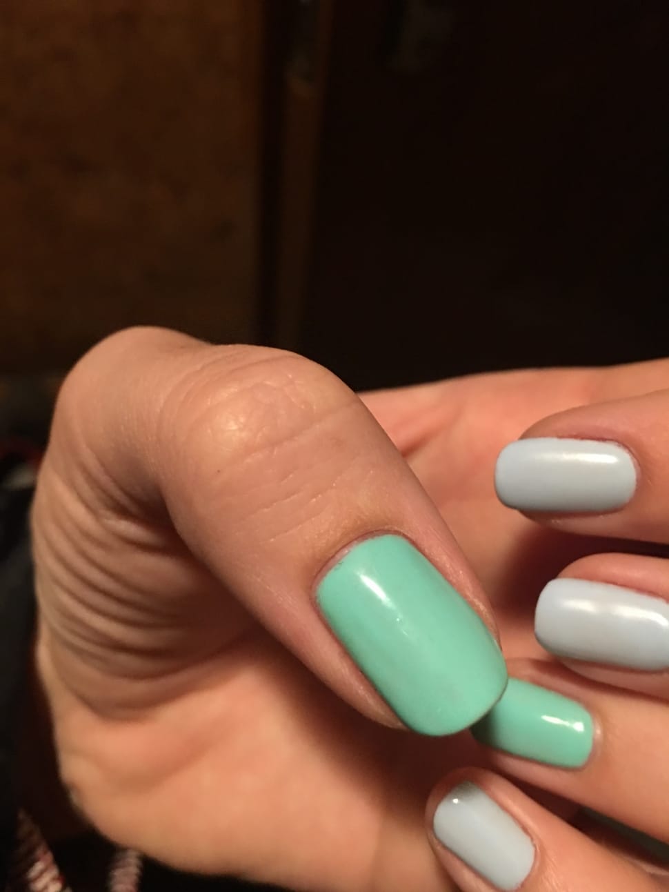 Does dark nail polish make hands look older? - Quora