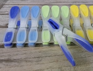 assorted color plastic clothespins thumbnail