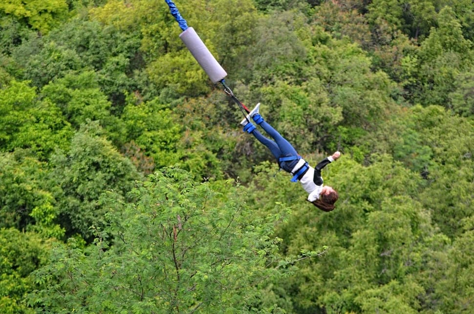 woman in blue jeans bungee jumping preview