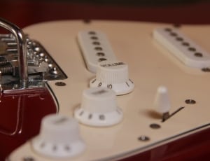 red and white electric guitar thumbnail