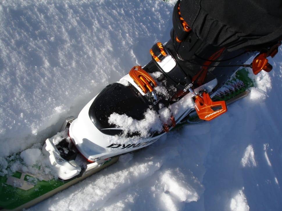 green white black and orange printed snow ski preview