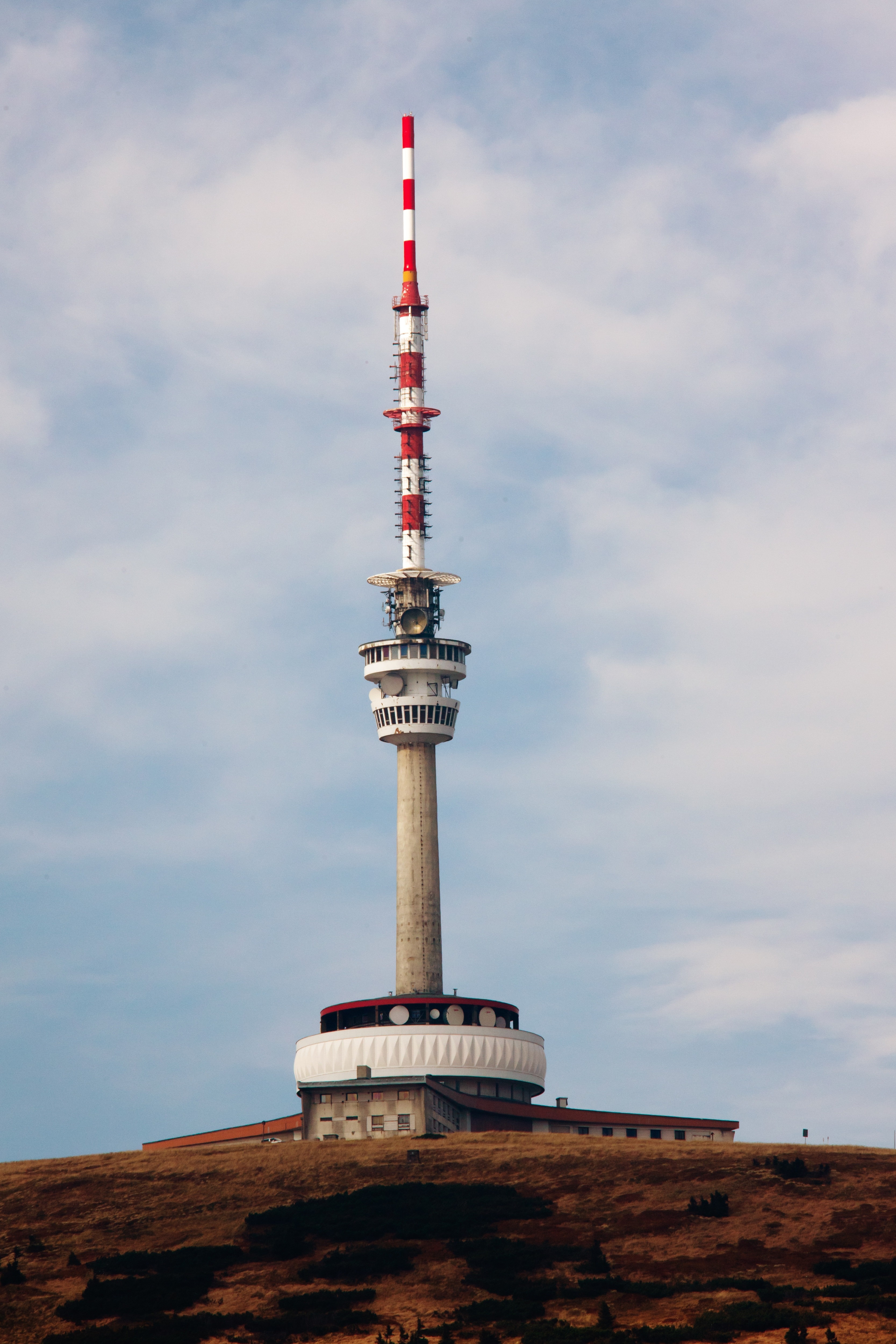 gray white and red satellite tower