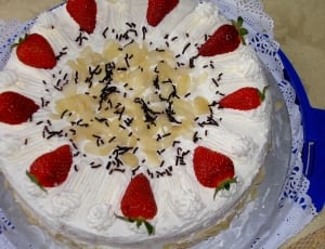 white and red frosted cake thumbnail