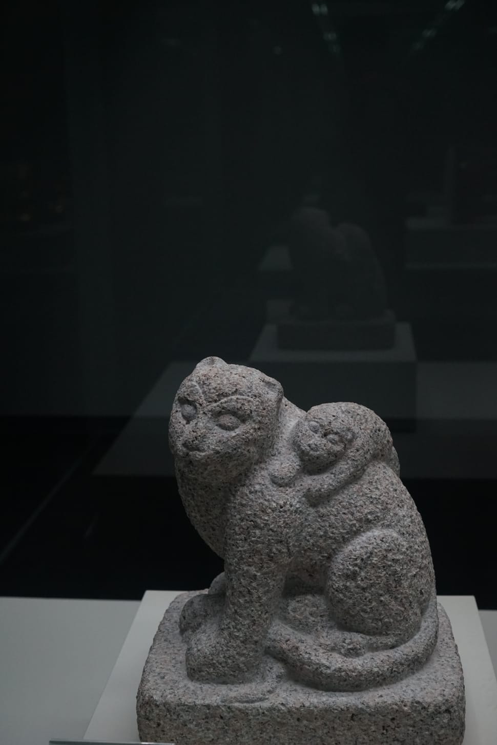 gray ceramic monkey figurines preview