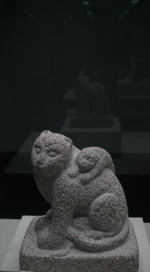 gray ceramic monkey figurines thumbnail