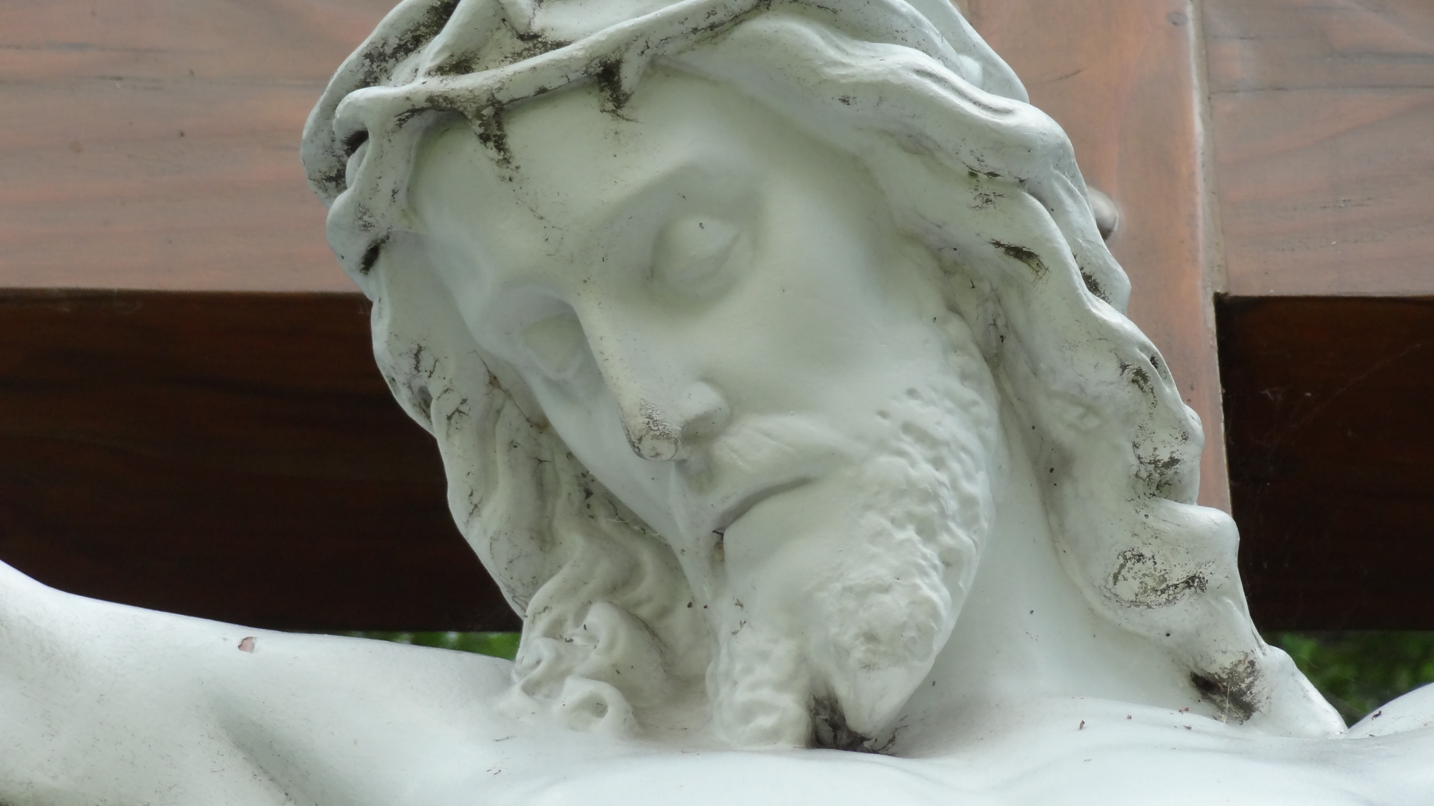white ceramic religious head bust
