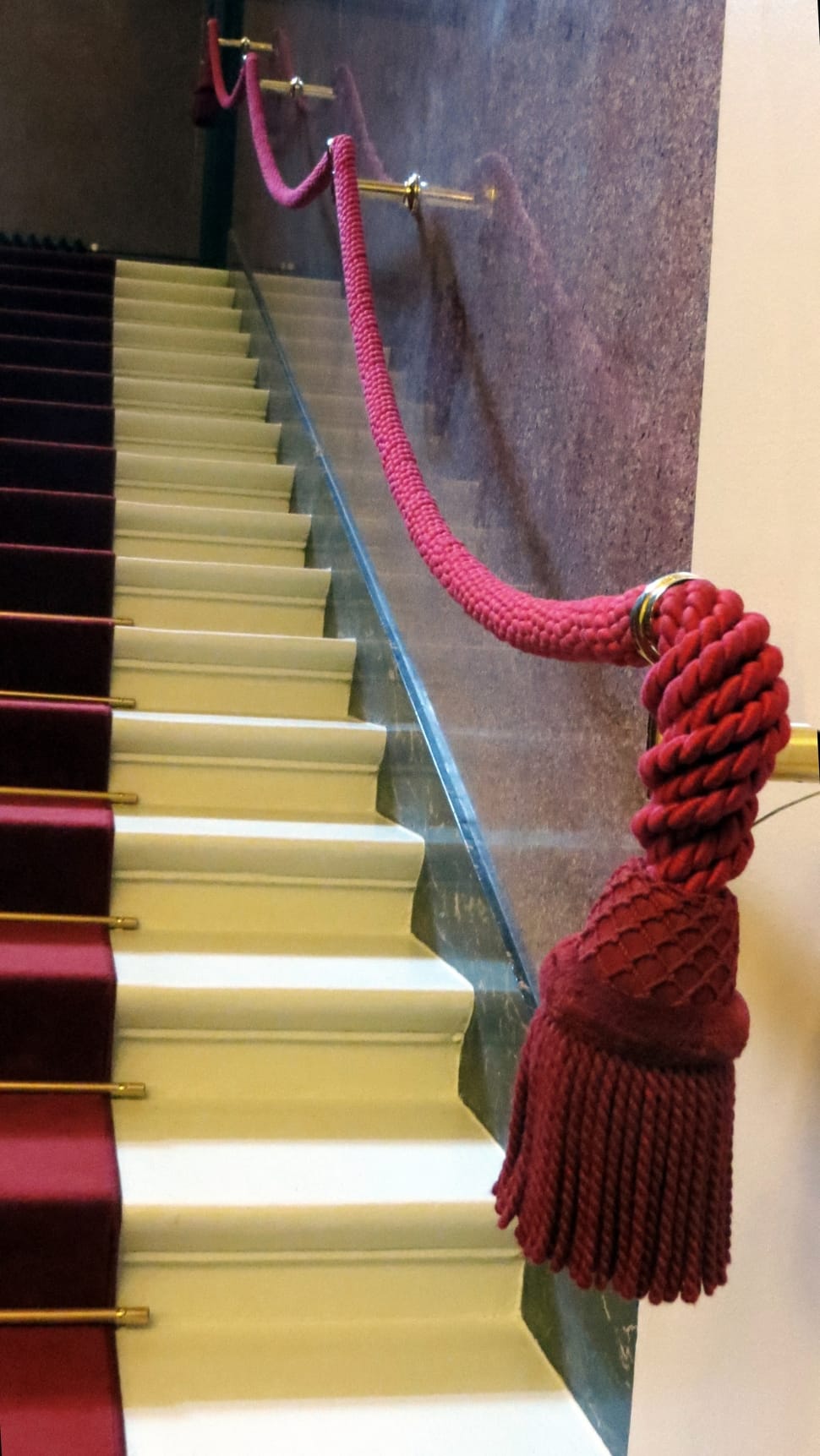 red rope and white stairs preview