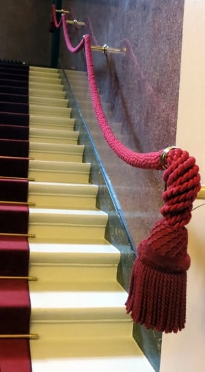 red rope and white stairs thumbnail