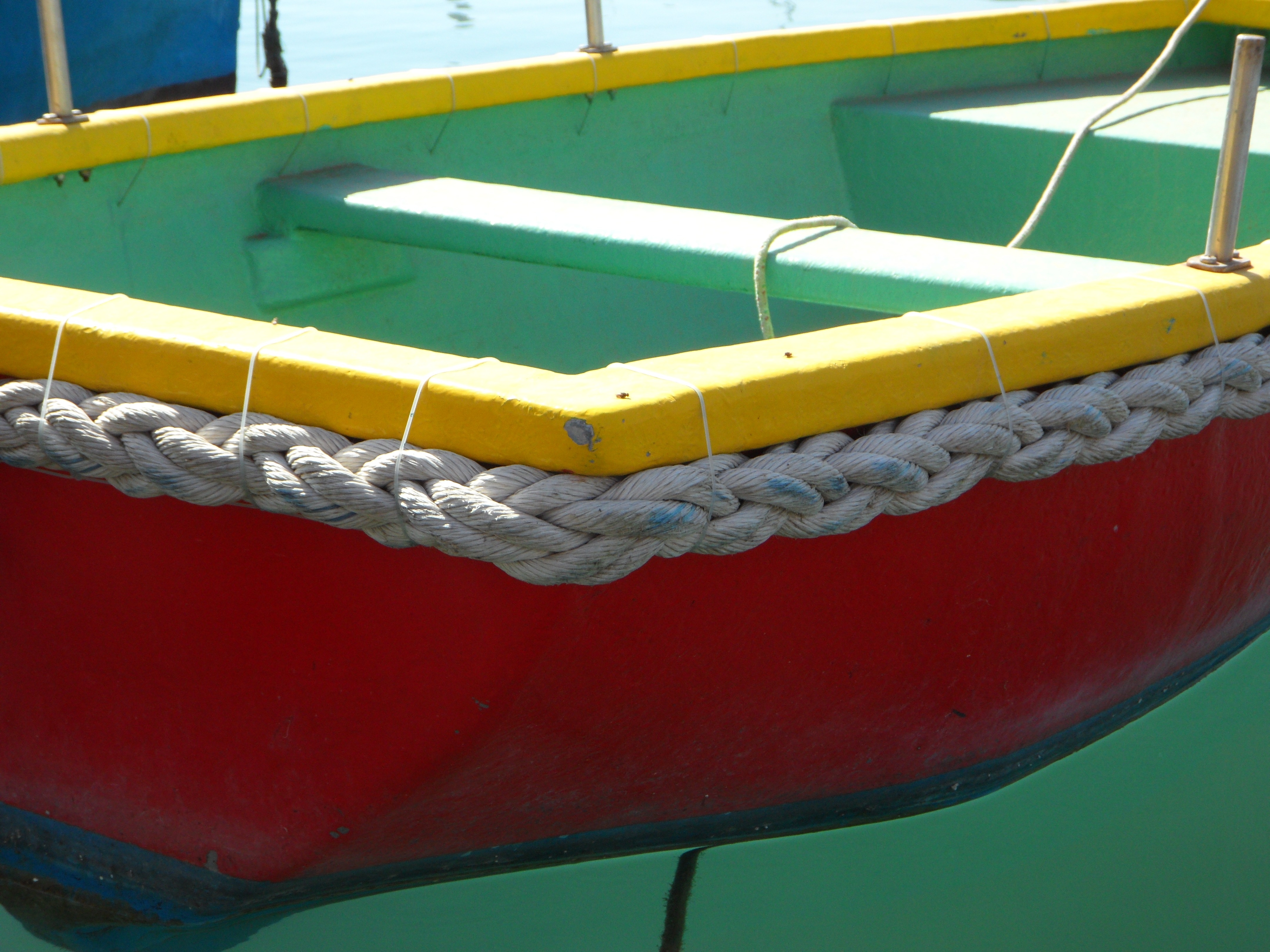 red yellow and green boat