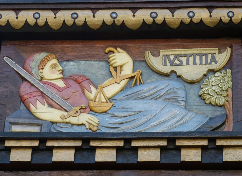 man holding balance scale embossed decoration preview