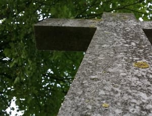 black concrete cross statue thumbnail