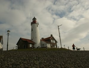 white and brown lighthouse thumbnail