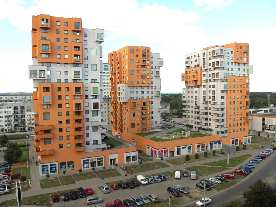 white and orange multi storey building preview