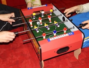red black yellow and blue fossball table thumbnail
