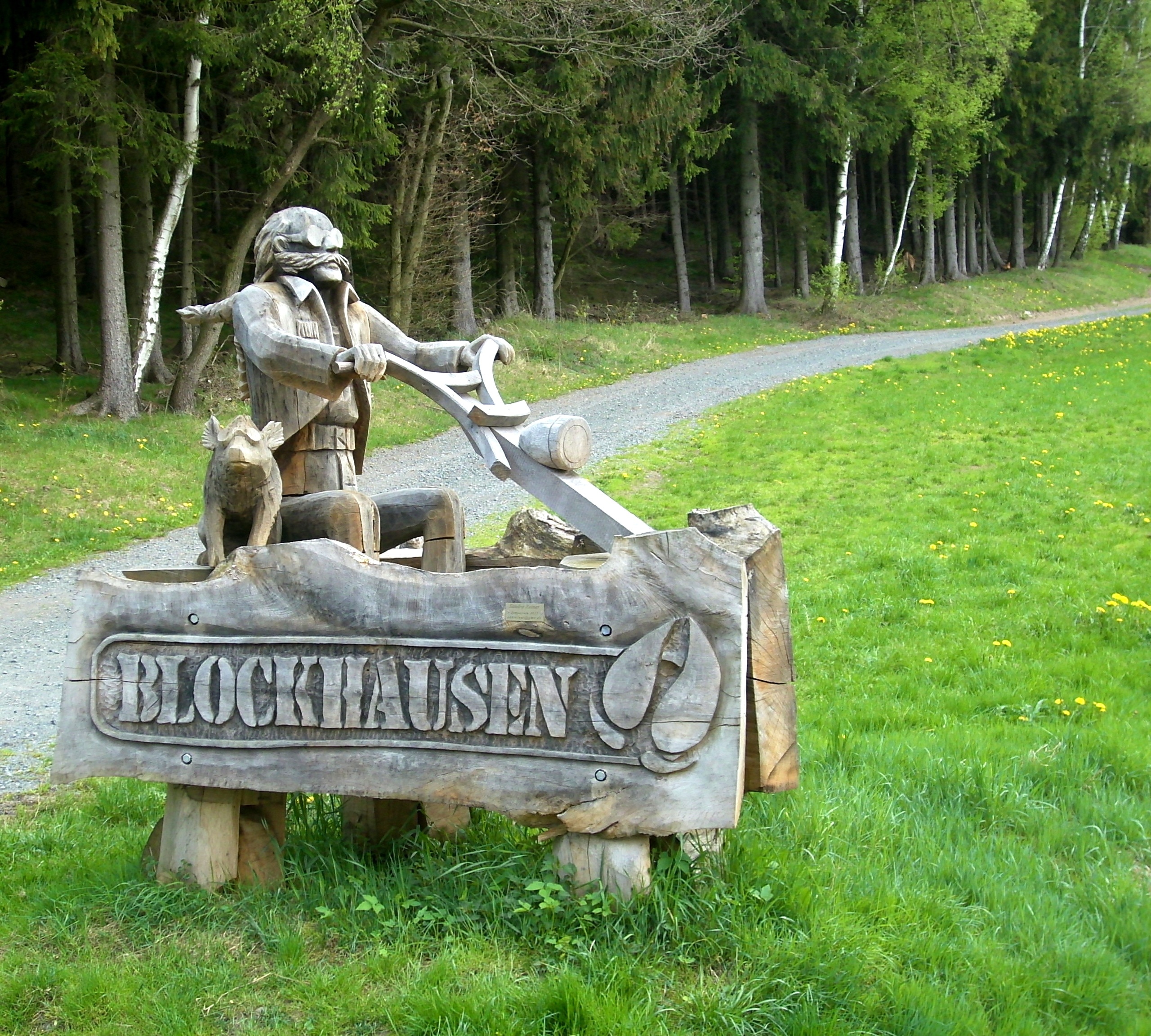 grey blockhausen wooden signage