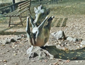grey animal statuette thumbnail