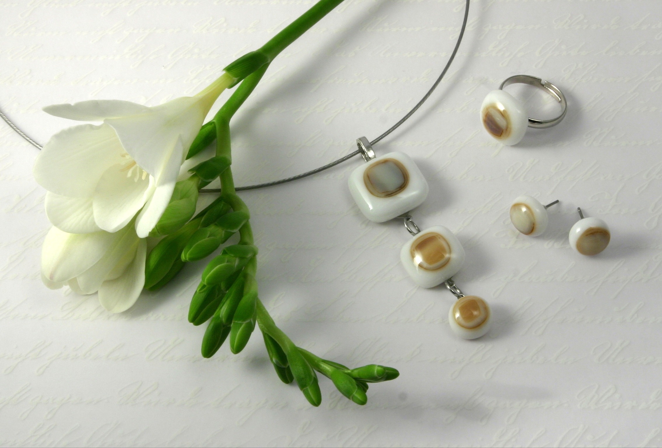 women's silver and white ring earrings and necklace