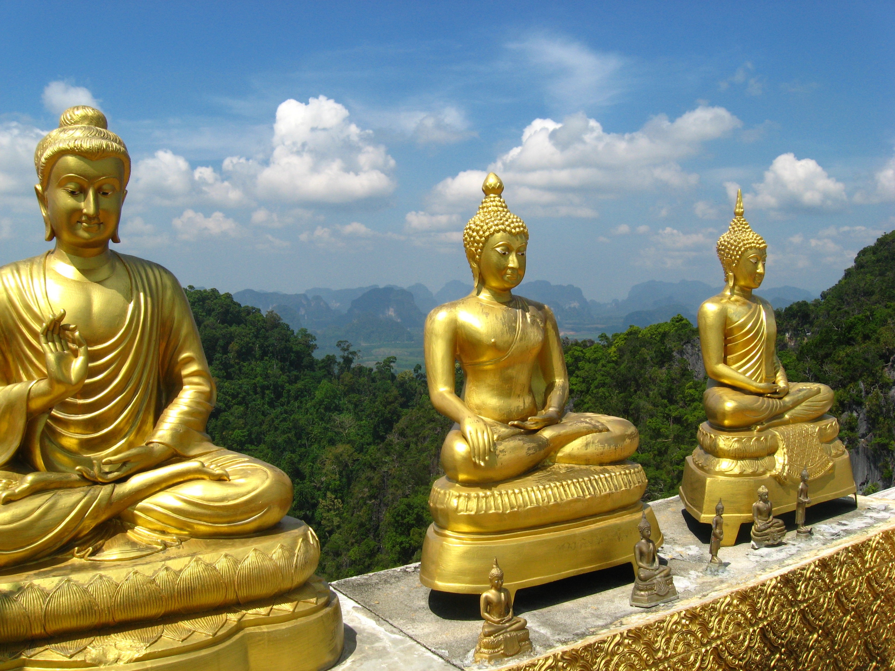 3 brass buddha figurines