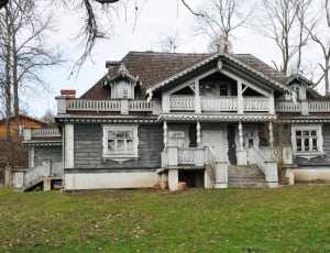 gray and white wooden classic house thumbnail