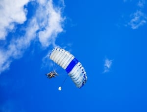 man riding parachute thumbnail
