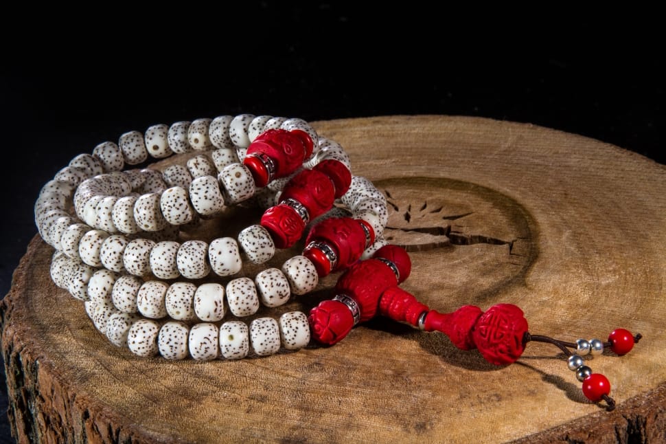 4 white and red beaded bracelets preview