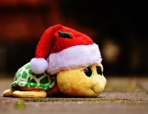 turtle wearing a santa hat plush toy thumbnail