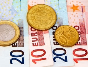 3 gold coins and 4 euro banknotes thumbnail