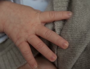 human baby hand thumbnail