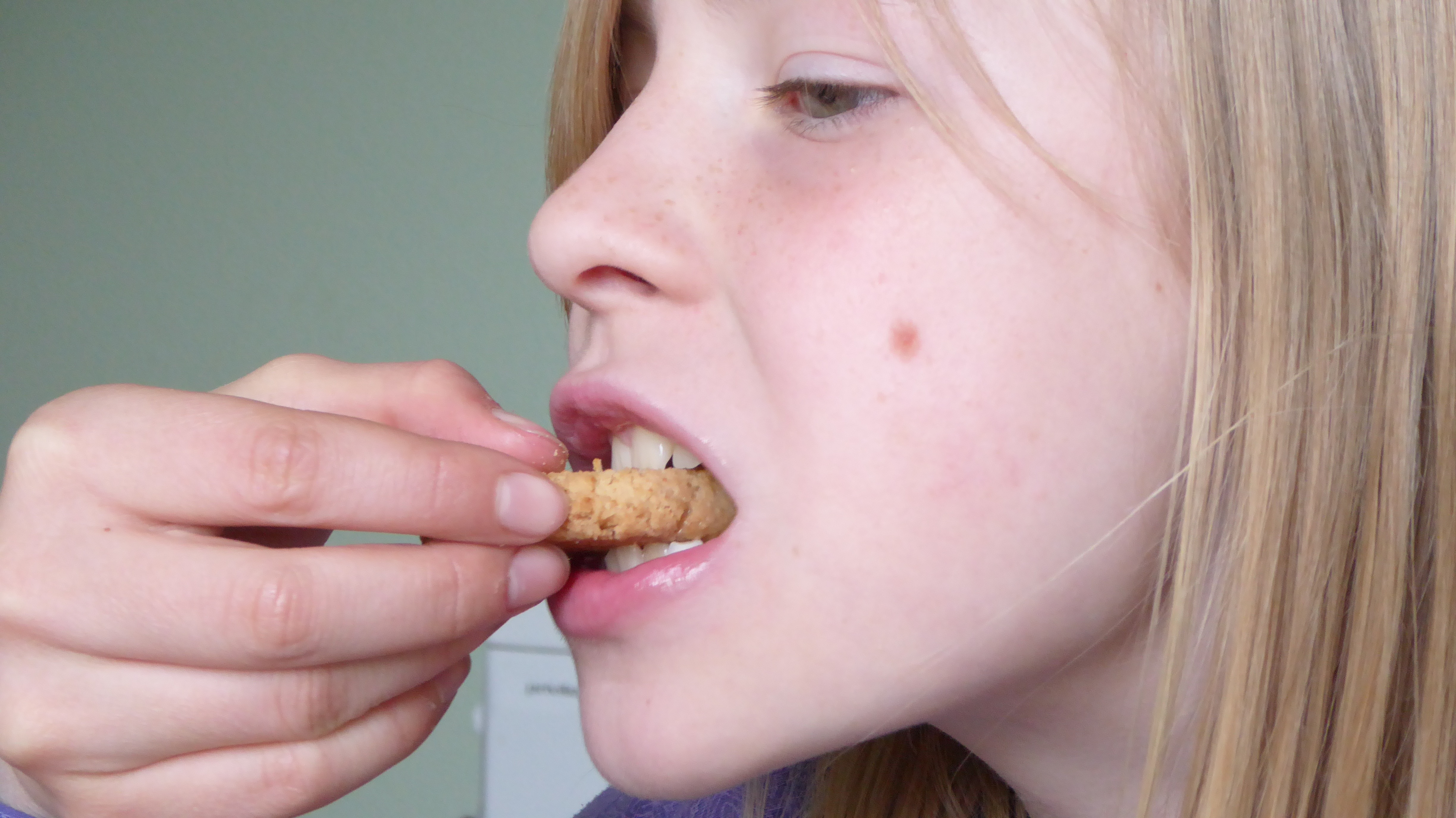 women eating cookies