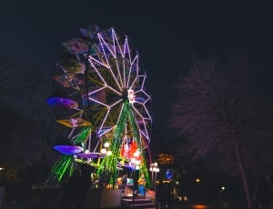 lighted carousel during night time thumbnail