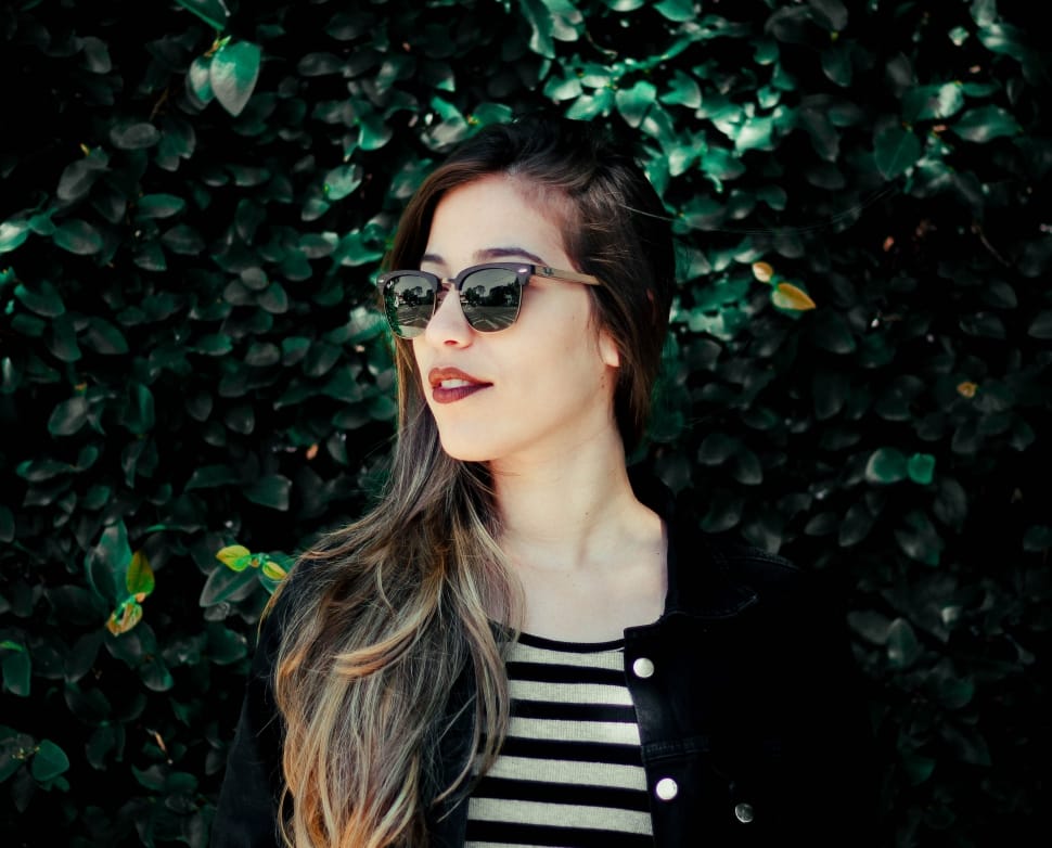 women wearing black frame  sunglasses  in day time preview