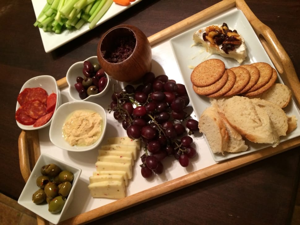 assorted food on brown wooden tray preview