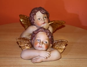 2 cherub ceramic figurines thumbnail
