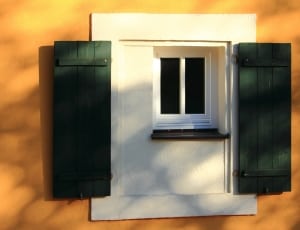 white and green wooden window thumbnail
