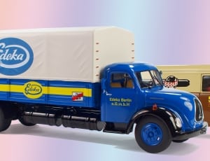 blue freight truck and utility van die-cast scale model thumbnail
