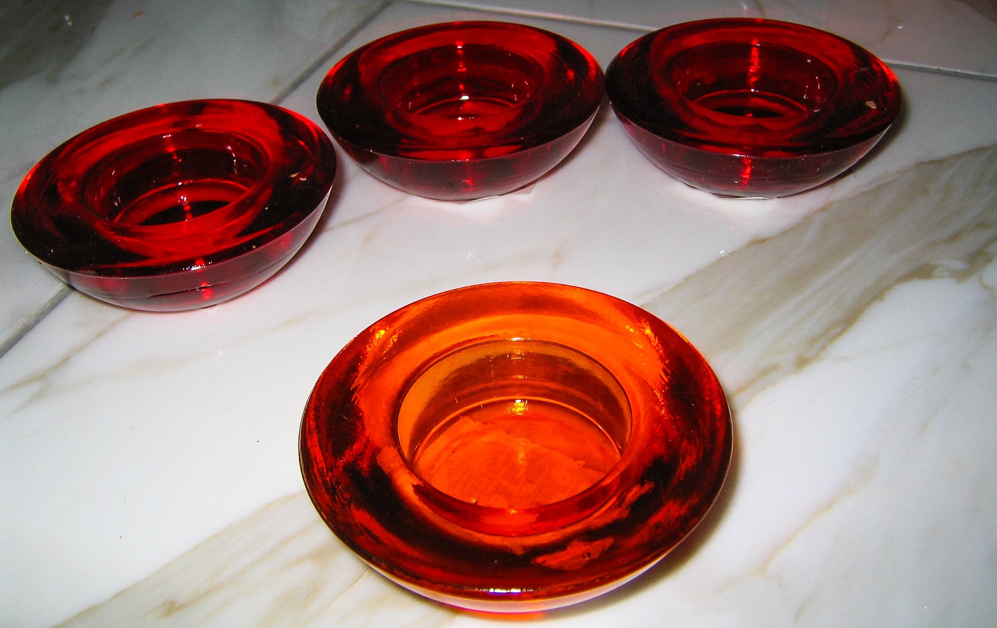 4 red glass round containers